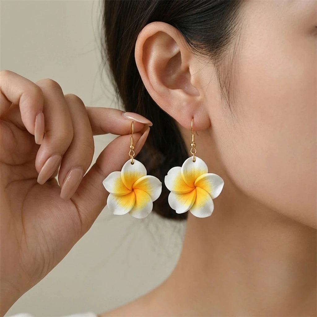 U'i Waiwai — Pua Melia Plumeria Drop Earrings